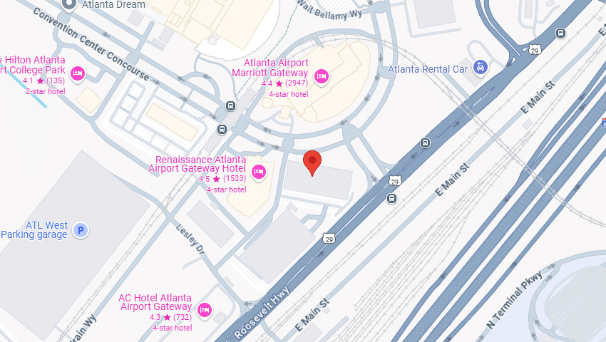 Map view showing Atlanta Airport area with several hotels, including Renaissance Atlanta Airport Gateway Hotel and Atlanta Airport Marriott Gateway. Notable roads include S. Terminal Pkwy and E. Main St. A red marker highlights a specific location.